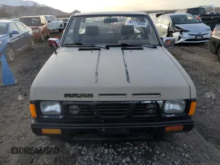 1986 Nissan Hardbody E z VIN JN6ND11S1GW037479, wystawiony jako Copart lot #81775934 z przebiegiem 389 841 mil mil oraz Szkody całkowita. Historia ofert i sprzedaży dostępna na DreamBid. Obrazek 5.