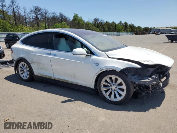 2016 Tesla Model X 70D z VIN 5YJXCAE26GF004233, wystawiony jako Copart lot #58378805 z przebiegiem 90 133 mil mil oraz Szkoda całkowita • Salvage title. Historia ofert i sprzedaży dostępna na DreamBid. Obrazek 4.
