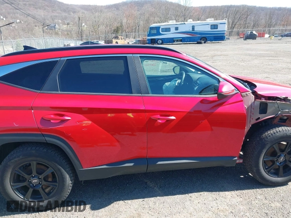 2022 Hyundai Tucson SEL z VIN 5NMJBCAE6NH157310, wystawiony jako IAAI lot #41938479 z przebiegiem 48 929 mil mil oraz . Historia ofert i sprzedaży dostępna na DreamBid. Obrazek 13.