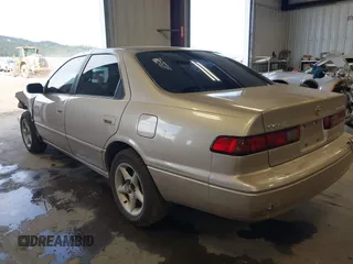 1999 Toyota Camry LE с VIN JT2BG22K7X0351800, выставлен на аукционе IAAI как лот 42216413 с пробегом 216 330 миль миль и . История ставок и продаж доступна на DreamBid. Изображение 3.
