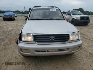 1999 Toyota Land Cruiser z VIN JT3HT05J9X0055914, wystawiony jako Copart lot #57261305 z przebiegiem 196 265 mil mil oraz Szkoda całkowita • Salvage title. Historia ofert i sprzedaży dostępna na DreamBid. Obrazek 5.