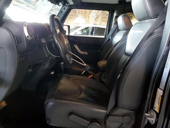 2015 Jeep Wrangler Unlimited Rubicon Hard Rock with VIN 1C4HJWFG1FL532288, listed as a Copart auction lot 62262545 with 91,807 mi miles and Salvage title. Bid and sale history available at DreamBid. Image 7.