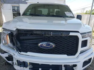 2018 Ford F-150 XL z VIN 1FTEX1CP3JFC70015, wystawiony jako IAAI lot #42095308 z przebiegiem 95 327 mil mil oraz . Historia ofert i sprzedaży dostępna na DreamBid. Obrazek 12.