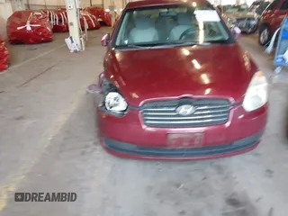 2007 Hyundai Accent GLS with VIN KMHCN46C27U111106, listed as a IAAI auction lot 41383317 with 147,882 mi miles. Bid and sale history available at carsss.com. Image 6.