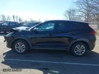 2016 Hyundai Tucson SE with VIN KM8J3CA41GU133962, listed as a IAAI auction lot 41634282 with 101,705 mi miles. Bid and sale history available at carsss.com. Image 14.