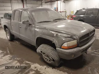 2003 Dodge Dakota Sport with VIN 1D7HG38X53S235378, listed as a IAAI auction lot 41400147 with 112,707 mi miles and . Bid and sale history available at carsss.com. Image 1.