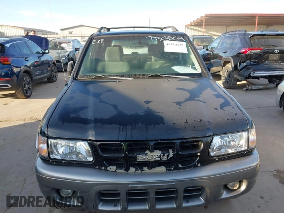 2002 Isuzu Rodeo S with VIN 4S2CK58WX24339782, listed as a IAAI auction lot 41340277 with 154,240 mi miles. Bid and sale history available at carsss.com. Image 6.