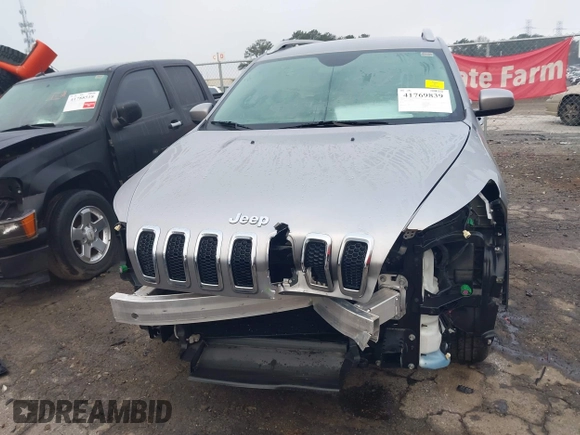 2016 Jeep Cherokee Latitude with VIN 1C4PJLCS7GW336973, listed as a IAAI auction lot 41769839 with 89,805 mi miles. Bid and sale history available at carsss.com. Image 13.