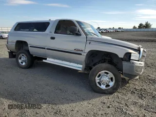 1999 Dodge Ram 2500 with VIN 3B7KF266XXM546245, listed as a Copart auction lot 74755734 with 123,219 mi miles and Salvage Title. Bid and sale history available at carsss.com. Image 4.