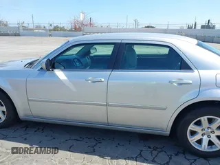 2007 Chrysler 300 Touring with VIN 2C3KA53G57H737815, listed as a IAAI auction lot 42126668 with 46,750 mi miles and . Bid and sale history available at DreamBid. Image 14.