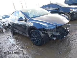 2024 Tesla Model Y Long Range with VIN 7SAYGDEE0RA300064, listed as a IAAI auction lot 41640541 with 5,049 mi miles and . Bid and sale history available at DreamBid. Image 1.
