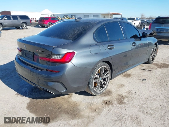 2020 BMW 3 Series M340i with VIN WBA5U7C04LFH15329, listed as a IAAI auction lot 41383675 with Not Provided miles. Bid and sale history available at carsss.com. Image 4.
