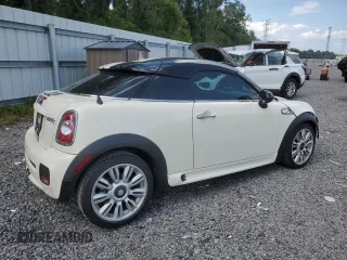 2012 MINI Coupe S z VIN WMWSX3C56CT154872, wystawiony jako Copart lot #68011264 z przebiegiem 91 650 mil mil oraz Szkody całkowita. Historia ofert i sprzedaży dostępna na DreamBid. Obrazek 3.