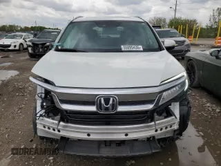 2020 Honda Pilot Touring 8-Passenger with VIN 5FNYF6H99LB050134, listed as a Copart auction lot 55095435 with 26,080 mi miles and Salvage title. Bid and sale history available at DreamBid. Image 5.