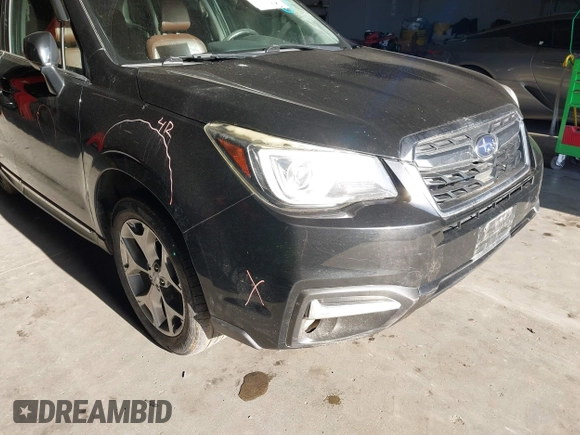 2017 Subaru Forester Touring z VIN JF2SJAWC8HH470269, wystawiony jako IAAI lot #41950347 z przebiegiem 135 189 mil mil oraz . Historia ofert i sprzedaży dostępna na DreamBid. Obrazek 21.
