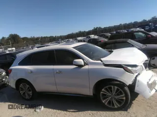 2018 Acura MDX w/Technology Pkg with VIN 5J8YD4H57JL016650, listed as a IAAI auction lot 40979704 with 82,980 mi miles. Bid and sale history available at carsss.com. Image 13.