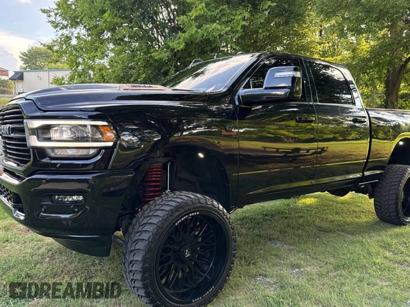 2024 Ram 2500 Laramie with VIN 3C6UR5FL9RG117209, listed as a Copart auction lot 64696495 with 47,038 mi miles and Clean title. Bid and sale history available at DreamBid. Image 2.