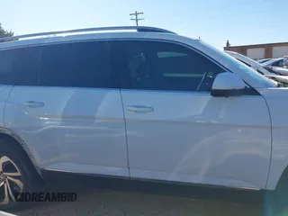 2021 Volkswagen Atlas SEL Premium z VIN 1V2TR2CA8MC562198, wystawiony jako IAAI lot #41853528 z przebiegiem 57 413 mil mil oraz . Historia ofert i sprzedaży dostępna na DreamBid. Obrazek 13.