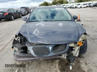 2009 Pontiac G5 z VIN 1G2AS18H397260884, wystawiony jako Copart lot #73531504 z przebiegiem 174 164 mil mil oraz Szkoda całkowita • Salvage title. Historia ofert i sprzedaży dostępna na DreamBid. Obrazek 5.
