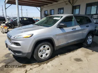 2015 Jeep Cherokee Sport with VIN 1C4PJMABXFW764091, listed as a Copart auction lot 61647965 with 128,683 mi miles and Salvage title. Bid and sale history available at DreamBid. Image 1.