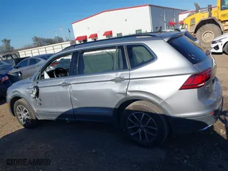 2020 Volkswagen Tiguan SE with VIN 3VV2B7AX4LM081188, listed as a IAAI auction lot 41655478 with 63,593 mi miles. Bid and sale history available at carsss.com. Image 14.
