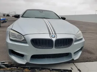 2014 BMW M6 z VIN WBSLZ9C56EDZ78719, wystawiony jako Copart lot #42445545 z przebiegiem 63 691 mil mil oraz Szkoda całkowita • Salvage title. Historia ofert i sprzedaży dostępna na DreamBid. Obrazek 5.