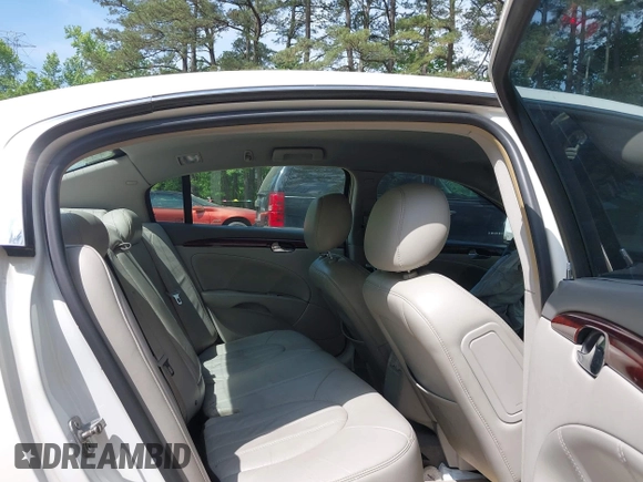 2009 Buick Lucerne CXL with VIN 1G4HD57M79U135698, listed as a IAAI auction lot 42165966 with 131,615 mi miles. Bid and sale history available at carsss.com. Image 8.