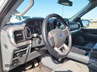 2022 Ford F-150 XL with VIN 1FTFW1ED9NFB83400, listed as a IAAI auction lot 42185777 with 115,145 mi miles. Bid and sale history available at carsss.com. Image 1.