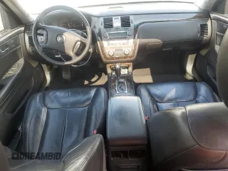 2009 Cadillac DTS 1SA z VIN 1G6KD57Y19U136085, wystawiony jako Copart lot #56983425 z przebiegiem 115 468 mil mil oraz Czysty tytuł • Clean title. Historia ofert i sprzedaży dostępna na DreamBid. Obrazek 8.