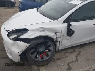 2022 Tesla Model Y Performance with VIN 7SAYGDEF0NF400560, listed as a IAAI auction lot 41783912 with 36,513 mi miles and . Bid and sale history available at DreamBid. Image 19.
