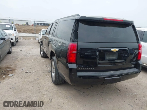 2015 Chevrolet Suburban LT with VIN 1GNSCJKC1FR304656, listed as a IAAI auction lot 42071124 with 133,140 mi miles. Bid and sale history available at carsss.com. Image 3.