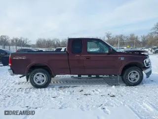 2000 Ford F-150 XL with VIN 1FTRX18L2YNA50128, listed as a IAAI auction lot 40956879 with 1 mi miles. Bid and sale history available at carsss.com. Image 12.