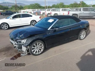 2018 Audi A5 Cabriolet Premium Plus z VIN WAUYNGF54JN008779, wystawiony jako IAAI lot #40763875 z przebiegiem 53 346 mil mil oraz . Historia ofert i sprzedaży dostępna na DreamBid. Obrazek 2.