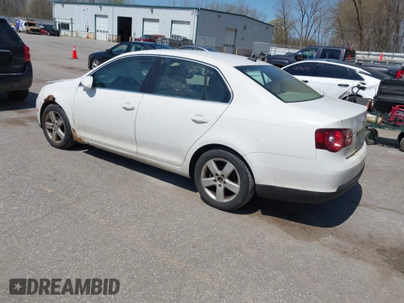 2009 Volkswagen Jetta SE z VIN 3VWRM71K99M057390, wystawiony jako IAAI lot #42094648 z przebiegiem 168 533 mil mil oraz . Historia ofert i sprzedaży dostępna na DreamBid. Obrazek 3.