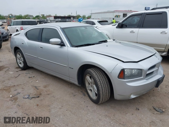 2008 Dodge Charger with VIN 2B3KA43R58H127973, listed as a IAAI auction lot 41893583 with 144,600 mi miles. Bid and sale history available at carsss.com. Image 1.