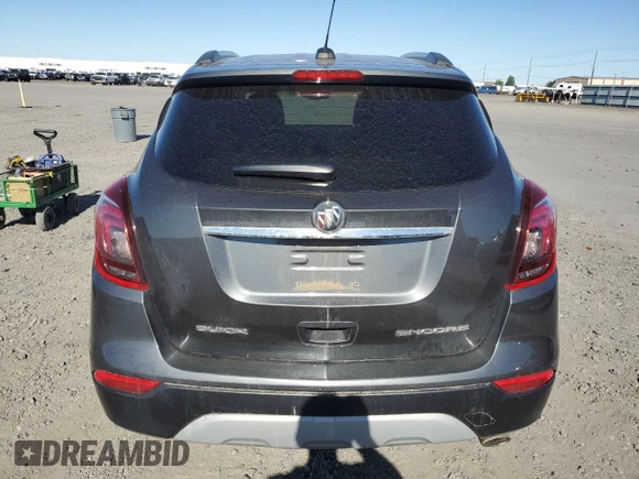 2017 Buick Encore Preferred with VIN KL4CJASB8HB051092, listed as a Copart auction lot 62181165 with 94,475 mi miles and Salvage title. Bid and sale history available at DreamBid. Image 6.