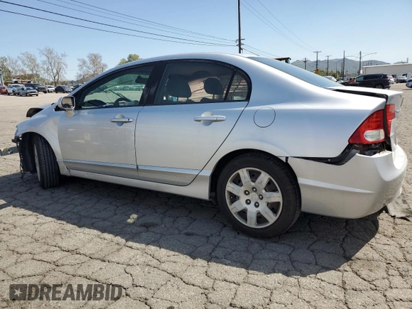 2010 Honda Civic LX with VIN 2HGFA1F57AH586100, listed as a Copart auction lot 50066965 with 192,401 mi miles and Salvage Title. Bid and sale history available at DreamBid. Image 2.