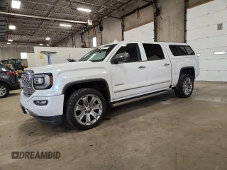 2018 GMC Sierra 1500 Denali z VIN 3GTU2PEJ2JG587157, wystawiony jako Copart lot #58516315 z przebiegiem 88 855 mil mil oraz Szkoda całkowita • Salvage title. Historia ofert i sprzedaży dostępna na DreamBid. Obrazek 1.