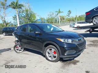 2021 Honda HR-V LX with VIN 3CZRU5H33MM726939, listed as a IAAI auction lot 41742626 with 52,086 mi miles. Bid and sale history available at carsss.com. Image 1.