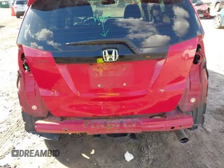 2013 Honda Fit Sport with VIN JHMGE8H57DC070211, listed as a IAAI auction lot 41866545 with 113,235 mi miles. Bid and sale history available at carsss.com. Image 18.