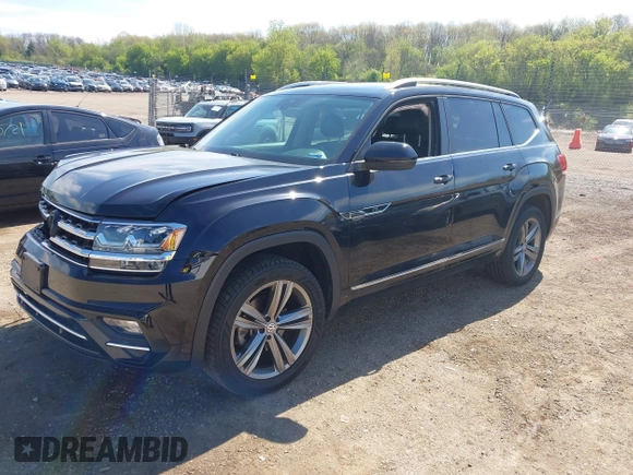 2019 Volkswagen Atlas SEL R-Line z VIN 1V2RR2CA0KC579035, wystawiony jako IAAI lot #42205407 z przebiegiem 66 188 mil mil oraz . Historia ofert i sprzedaży dostępna na DreamBid. Obrazek 17.