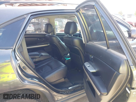 2006 Lexus RX 400h with VIN JTJHW31U560009707, listed as a IAAI auction lot 42148672 with 198,569 mi miles and . Bid and sale history available at DreamBid. Image 8.