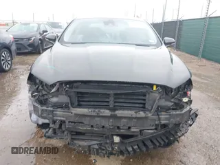 2020 Ford Fusion Titanium with VIN 3FA6P0K97LR192657, listed as a IAAI auction lot 42170258 with 87,696 mi miles and . Bid and sale history available at DreamBid. Image 13.