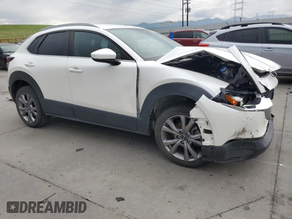 2022 Mazda CX-30 S Select with VIN 3MVDMBBL9NM411859, listed as a Copart auction lot 59875745 with 52,878 mi miles and Salvage title. Bid and sale history available at DreamBid. Image 4.