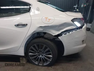 2020 Maserati Ghibli S Q4 z VIN ZAM57YTAXL1354588, wystawiony jako IAAI lot #42337502 z przebiegiem 60 681 mil mil oraz . Historia ofert i sprzedaży dostępna na DreamBid. Obrazek 18.