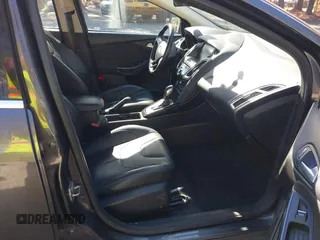 2015 Ford Focus Titanium with VIN 1FADP3J25FL333743, listed as a IAAI auction lot 41857057 with 120,917 mi miles and . Bid and sale history available at carsss.com. Image 5.