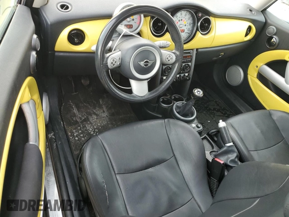 2006 MINI Hardtop z VIN WMWRC33586TK64062, wystawiony jako Copart lot #56115515 z przebiegiem 170 815 mil mil oraz Szkoda całkowita • Salvage title. Historia ofert i sprzedaży dostępna na DreamBid. Obrazek 8.