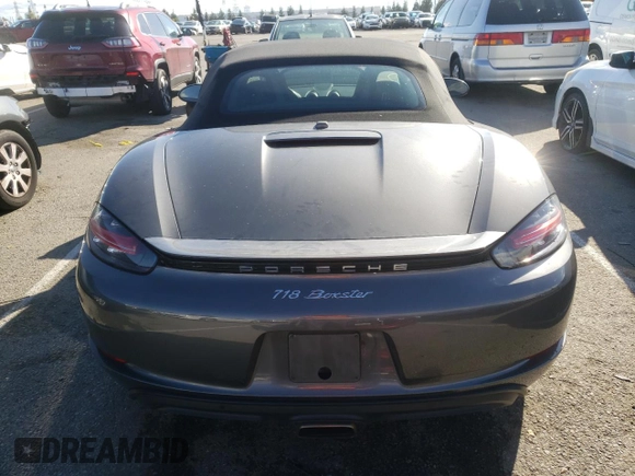 2017 Porsche 718 Boxster z VIN WP0CA2A81HS221942, wystawiony jako Copart lot #36581523 z przebiegiem 73 954 mil mil oraz . Historia ofert i sprzedaży dostępna na DreamBid. Obrazek 6.