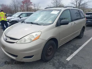 2006 Toyota Sienna CE with VIN 5TDZA23C06S459895, listed as a IAAI auction lot 41965466 with 208,688 mi miles and . Bid and sale history available at DreamBid. Image 2.