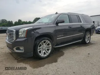 2016 GMC Yukon XL SLT z VIN 1GKS1GKC7GR466749, wystawiony jako Copart lot #52758285 z przebiegiem 165 096 mil mil oraz Czysty tytuł • Clean title. Historia ofert i sprzedaży dostępna na DreamBid. Obrazek 1.